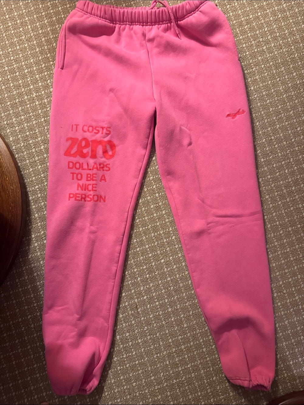 Mayfair “It Costs Zero Dollars To Be”Pink Fleece Jogger Pants - Positive Message